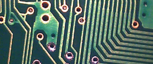 Printed circuit board with tracks and vias