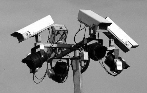 Surveillance cameras in CCTV in a public place.